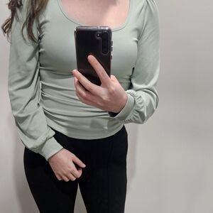 Green  long-sleeved top